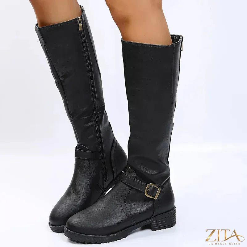 Zita La Belle Elite round toe block heel boots featuring sleek black leather with sturdy block heels and stylish ankle length design.