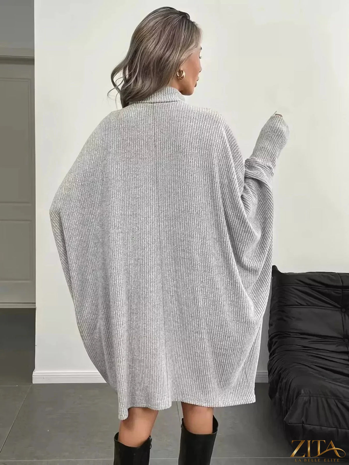 Zita La Belle Elite oversized batwing sleeve ribbed knit turtleneck dress, shown in a stylish and cozy silhouette with textured fabric.