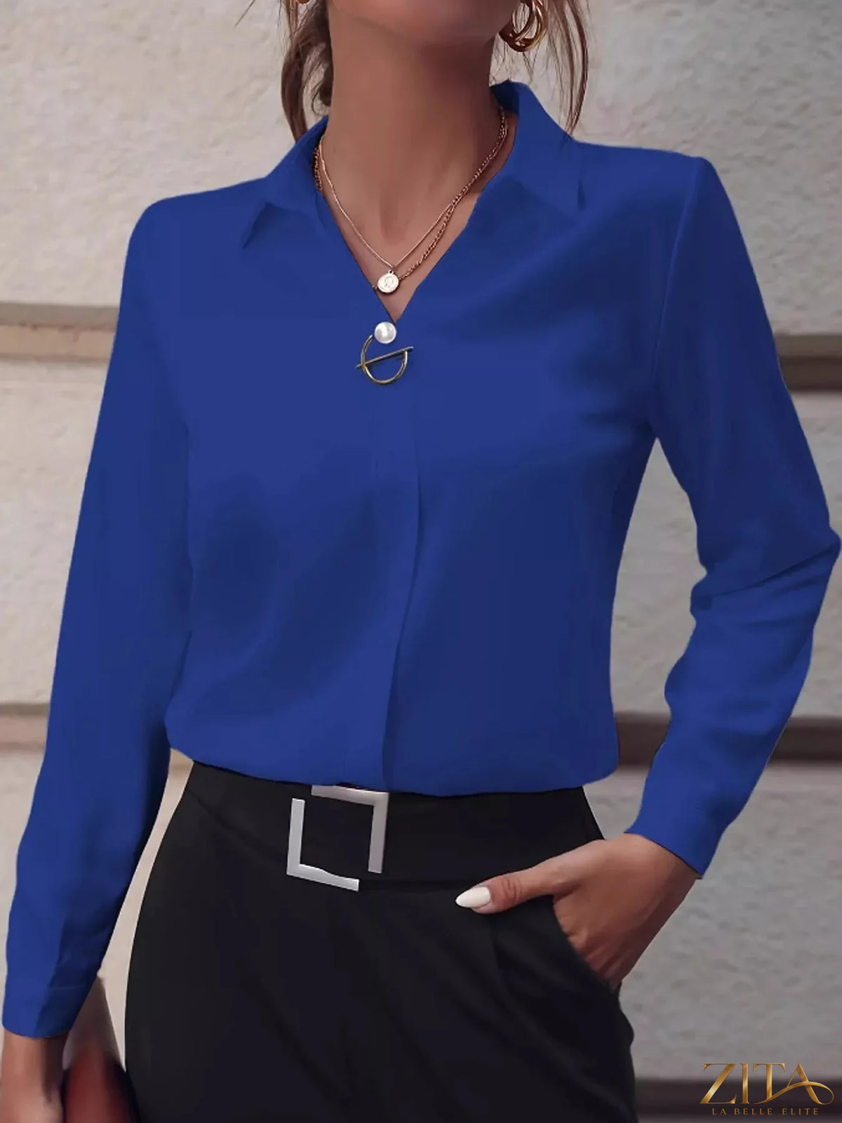 Zita La Belle Elite long sleeve satin blouse in elegant, smooth fabric with a classic collar and button front, shown on a hanger.