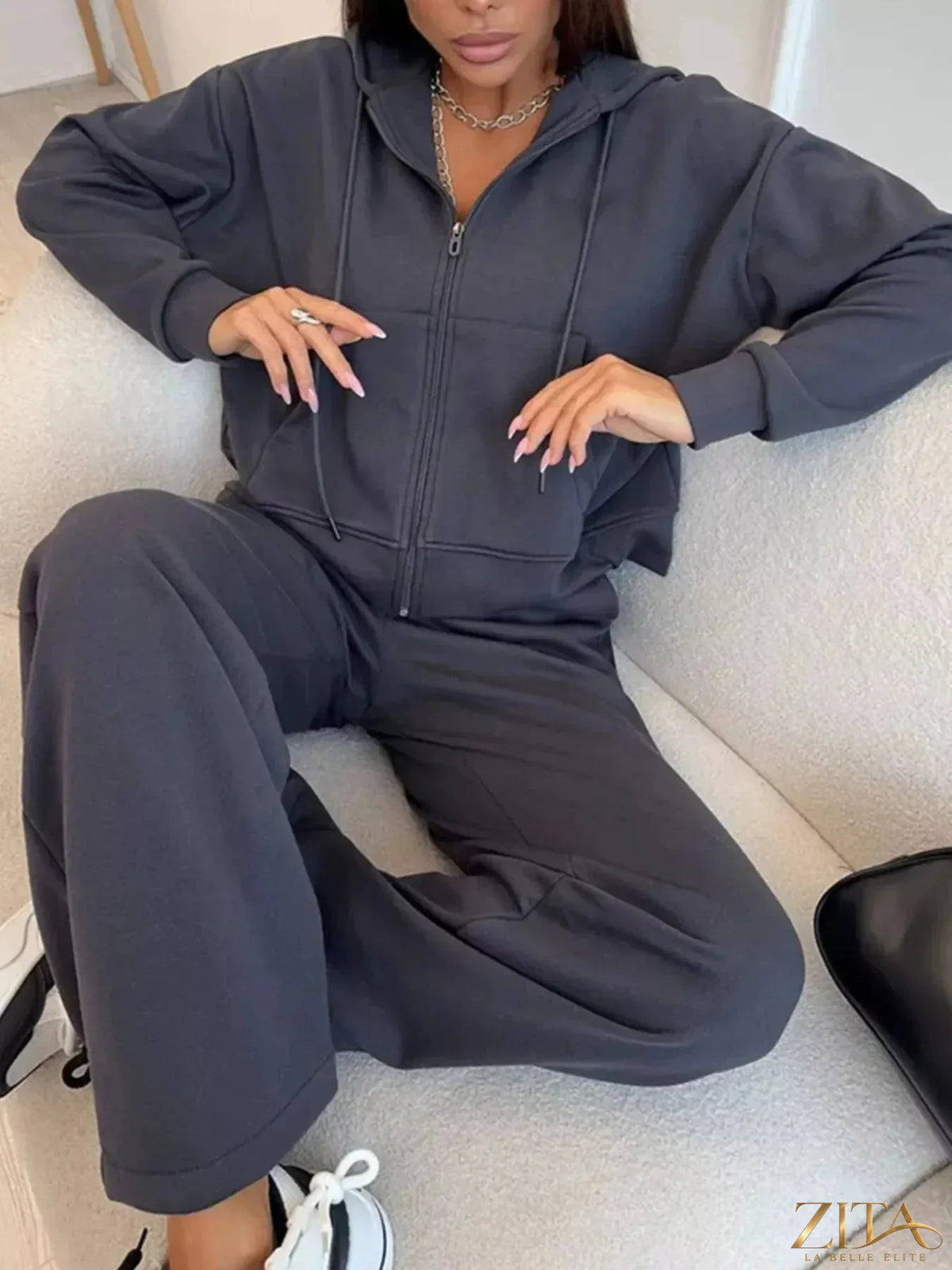 Zita La Belle Elite zip-up hoodie and wide-leg pants set in soft fabric, shown on a model with casual streetwear style.