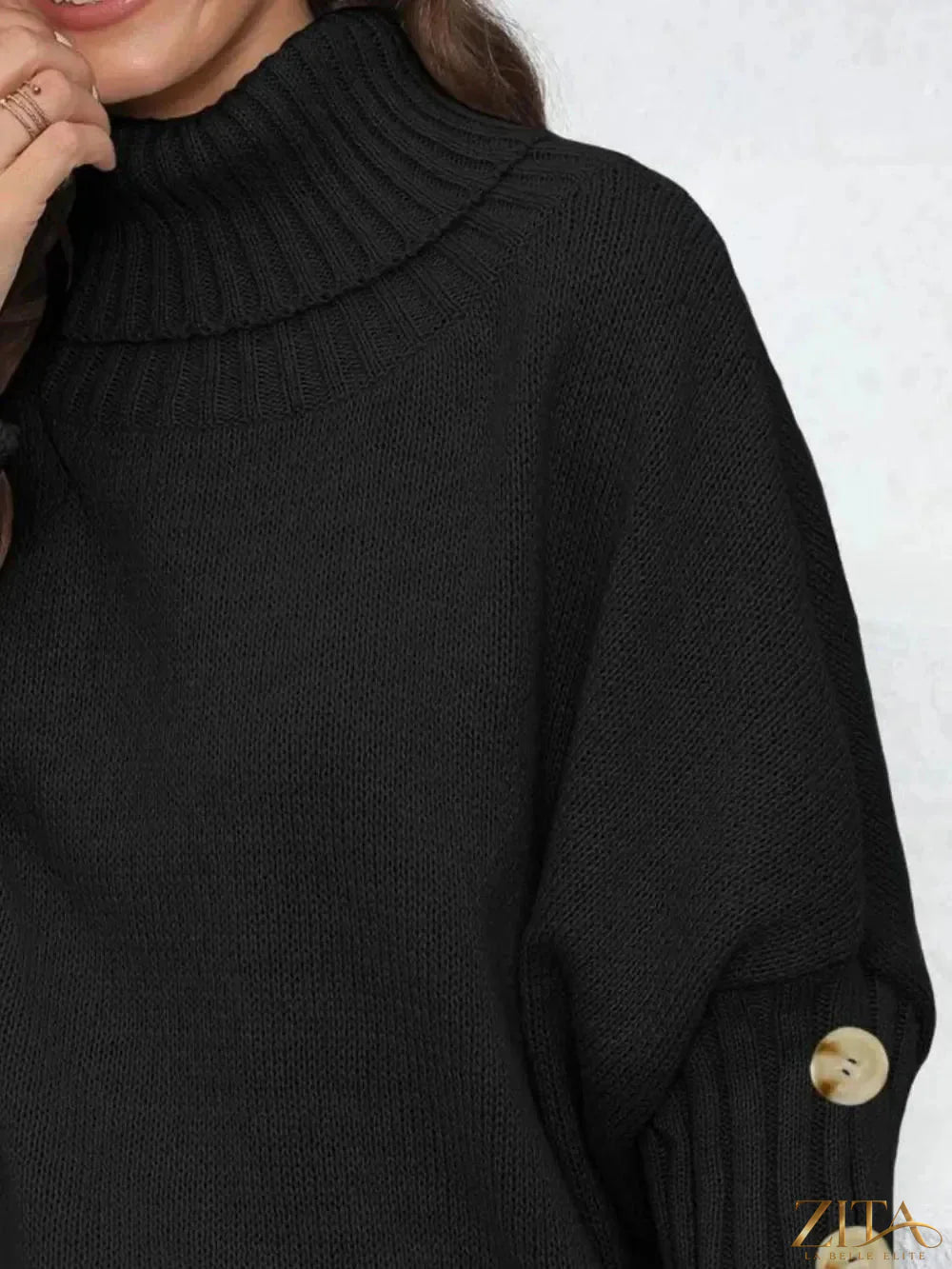 Black turtleneck long sleeve sweater by Trendsi, close-up of ribbed knit fabric and fitted design.