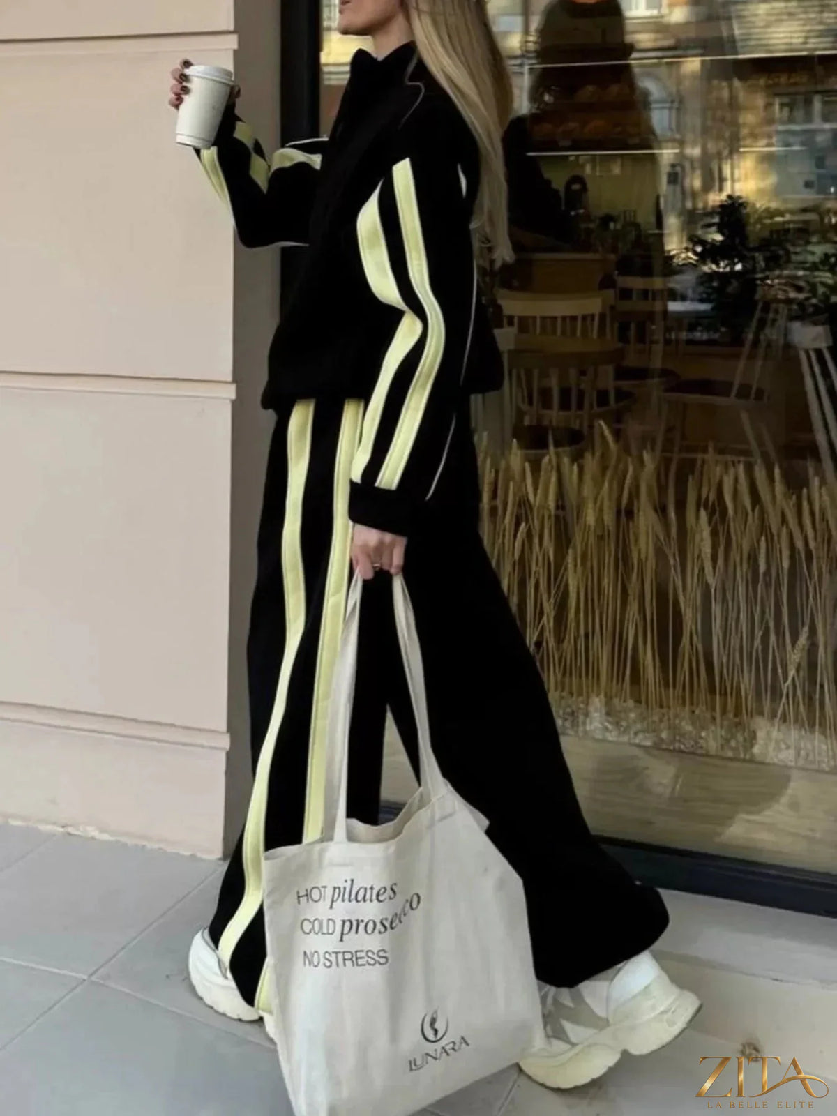 Zita La Belle Elite contrast striped zip-up top and matching pants set, casual loungewear with bold black and white pattern.