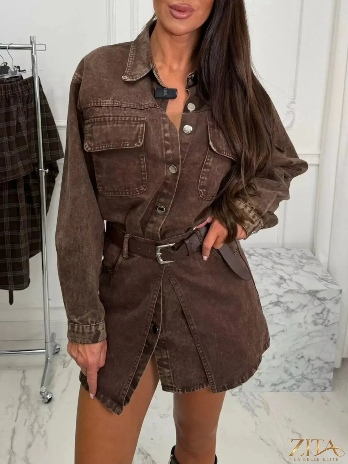 Vintage washed denim jacket by Zita La Belle Elite with chest pockets, showcasing a classic, rugged style and distressed denim fabric.
