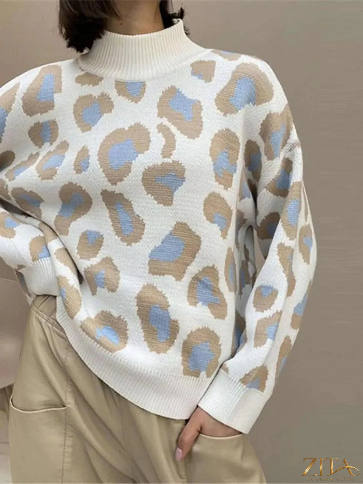 Zita La Belle Elite leopard print high neck sweater featuring a cozy fit and stylish design.