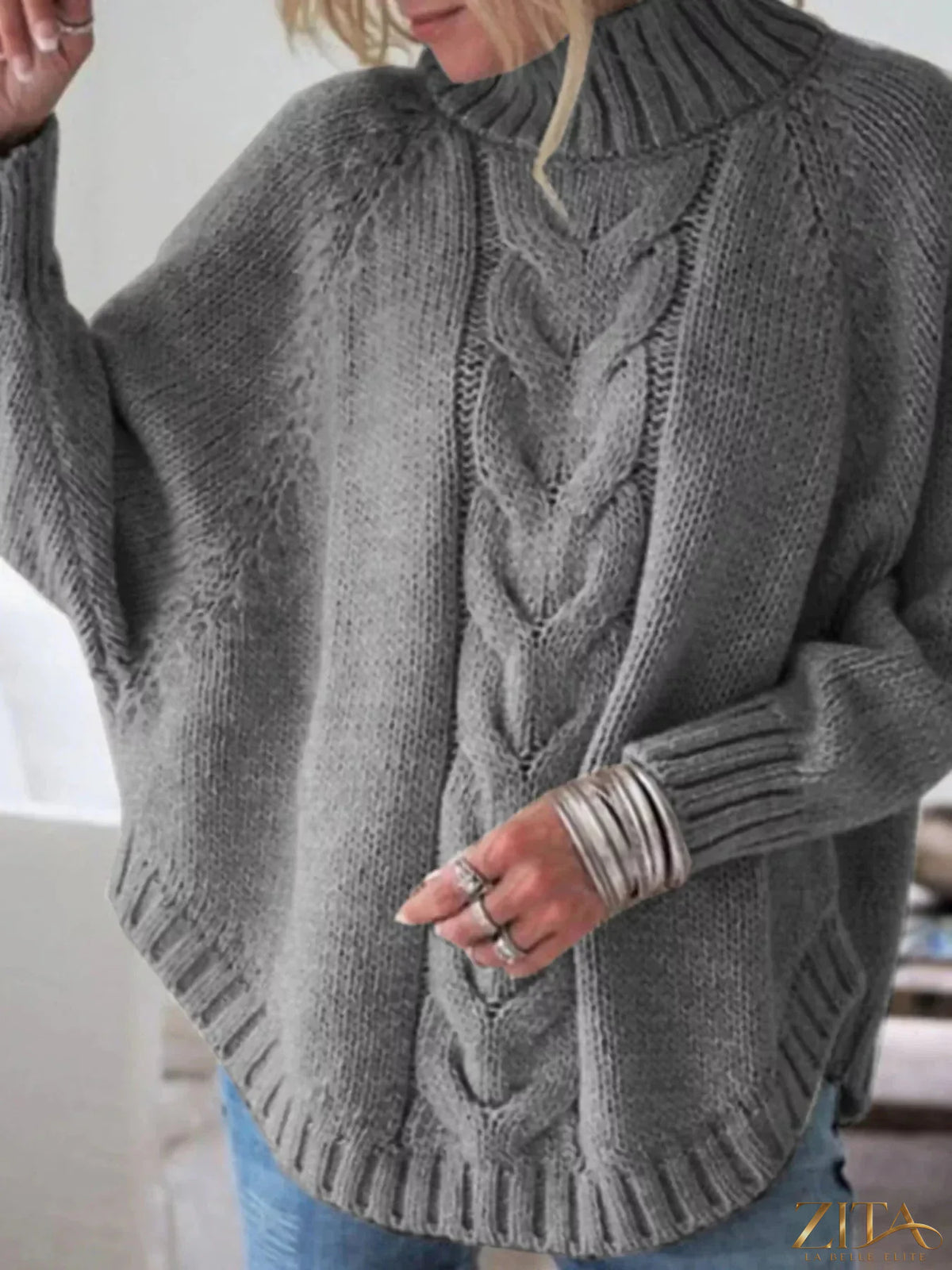 Zita La Belle Elite cable-knit long sleeve sweater in cozy knit fabric, featuring a classic crew neckline and textured pattern.