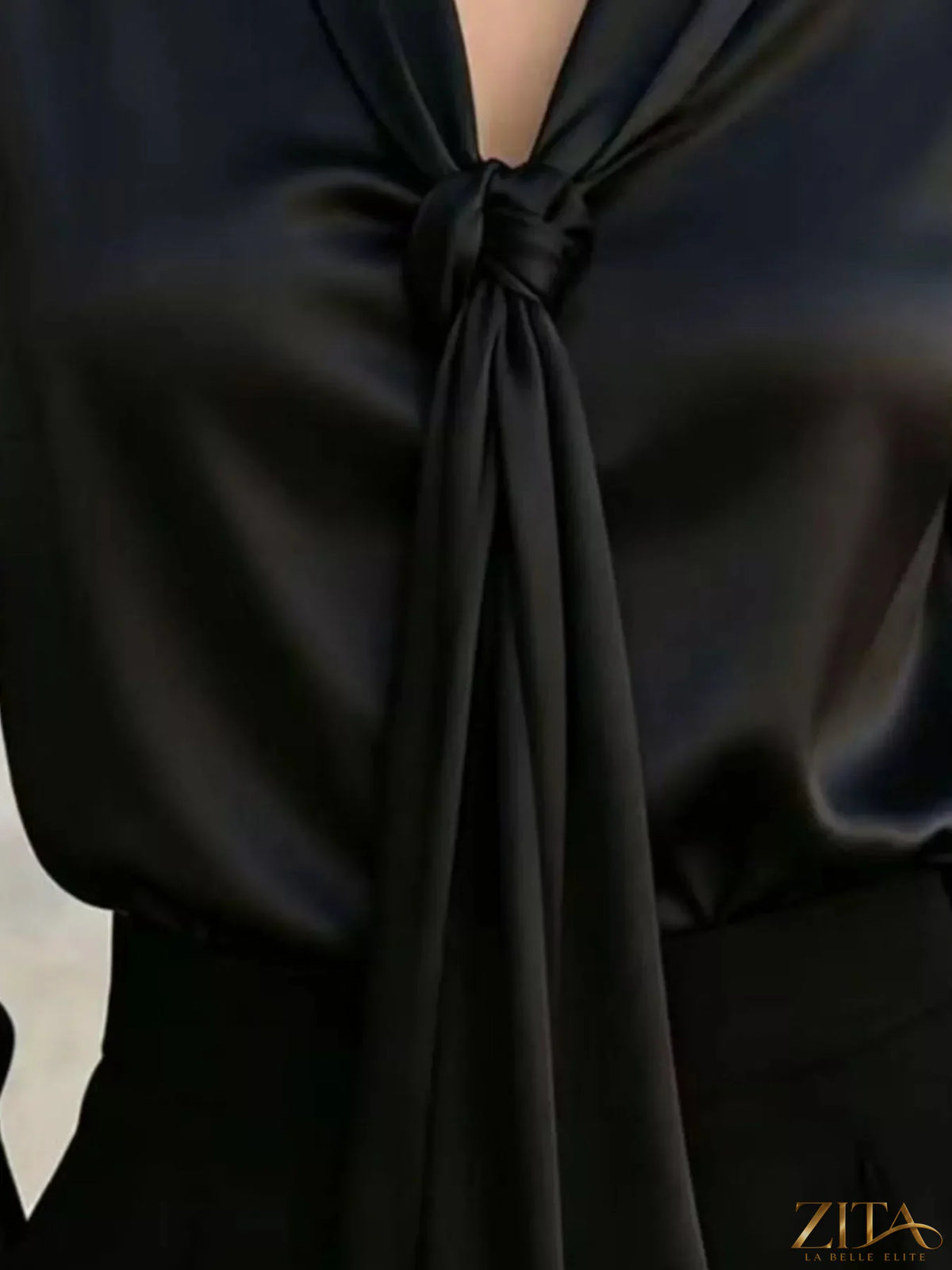 Zita La Belle Elite satin blouse with front tie detail, featuring a sleek, elegant design and smooth fabric.