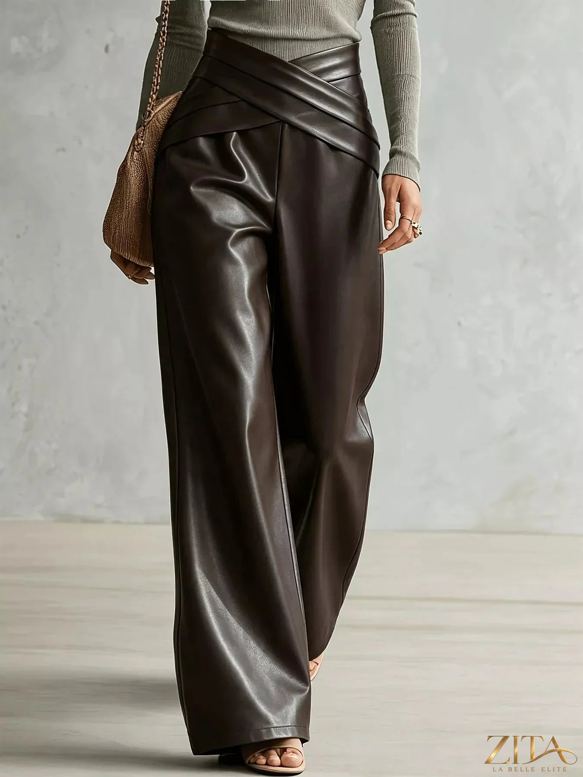 Zita La Belle Elite criss-cross wide-leg pants in black, featuring a relaxed fit and stylish design, shown on a model.