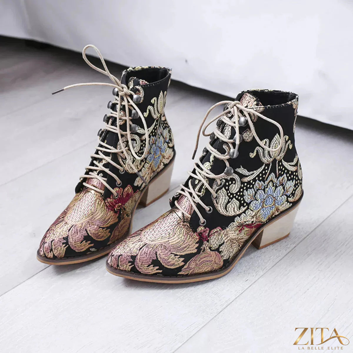 Zita La Belle Elite embroidered floral lace-up ankle boots with intricate lace detail and floral embroidery on tan leather.