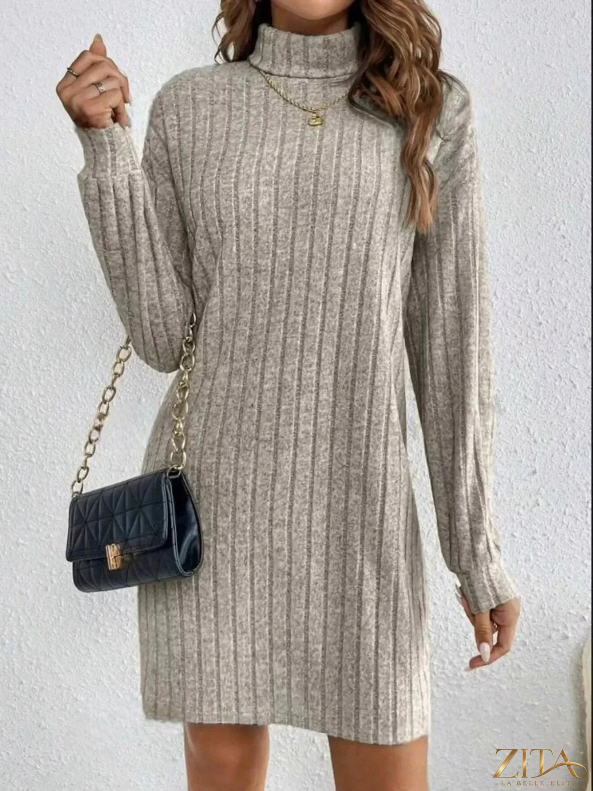 Casual ribbed turtleneck long sleeve mini dress by Trendsi, featuring a fitted silhouette and soft knit fabric in a neutral color.
