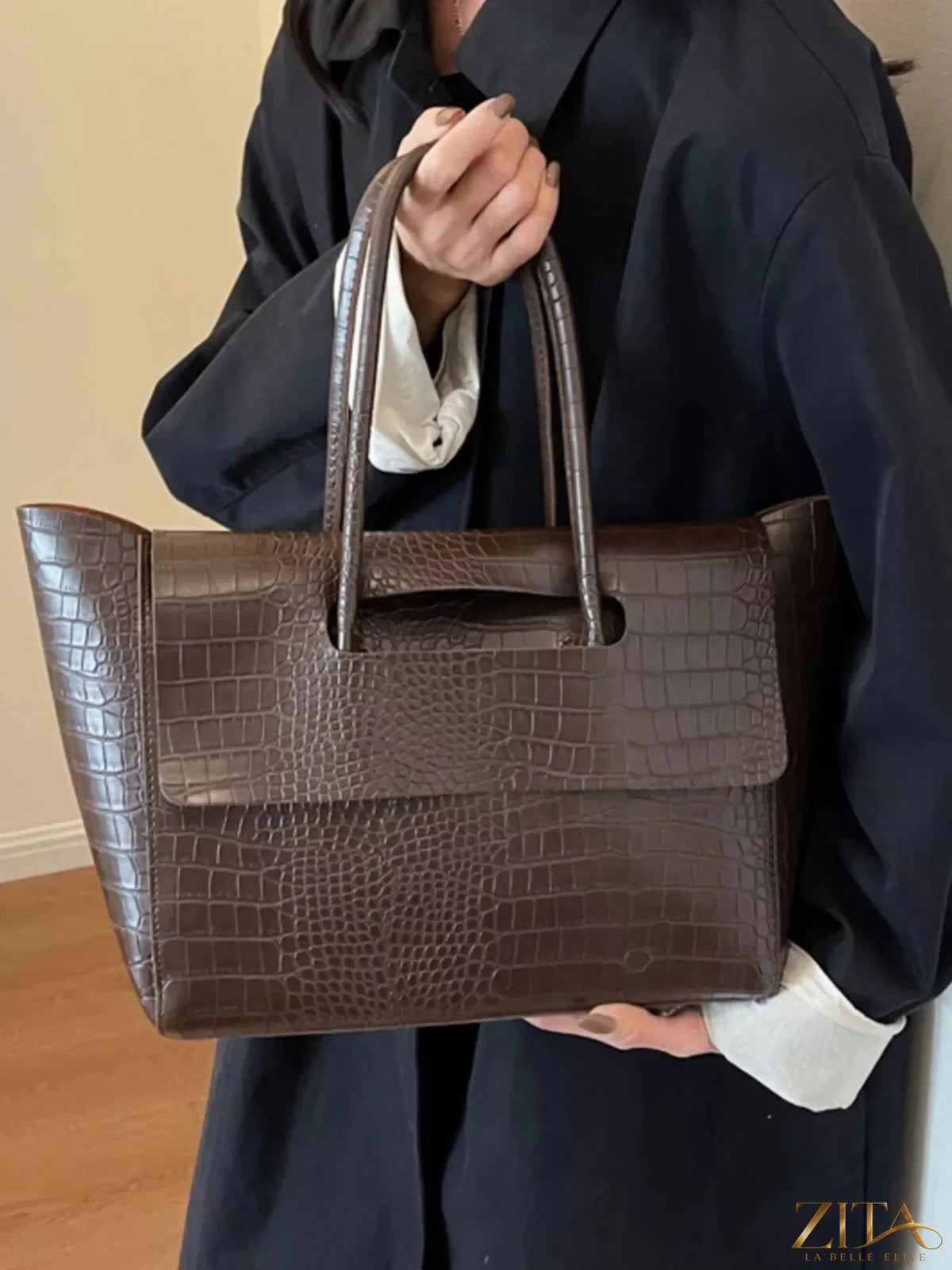 Crocodile embossed tote bag by Zita La Belle Elite with structured design and top handles, showcasing elegant textured leather appearance.
