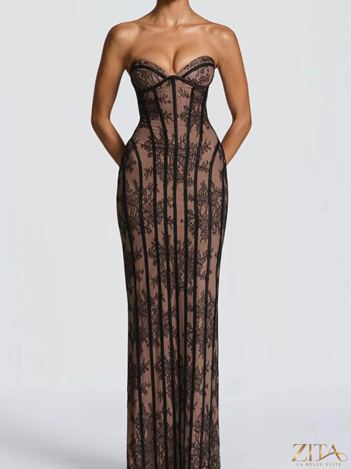 Zita La Belle Elite lace-up back strapless maxi dress with flowing fabric and elegant design, suitable for formal occasions.