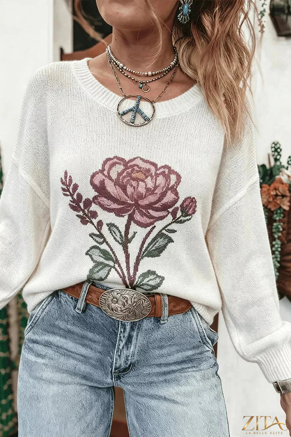 Zita La Belle Elite rose dropped shoulder sweater featuring a soft knit fabric and relaxed fit on a model.