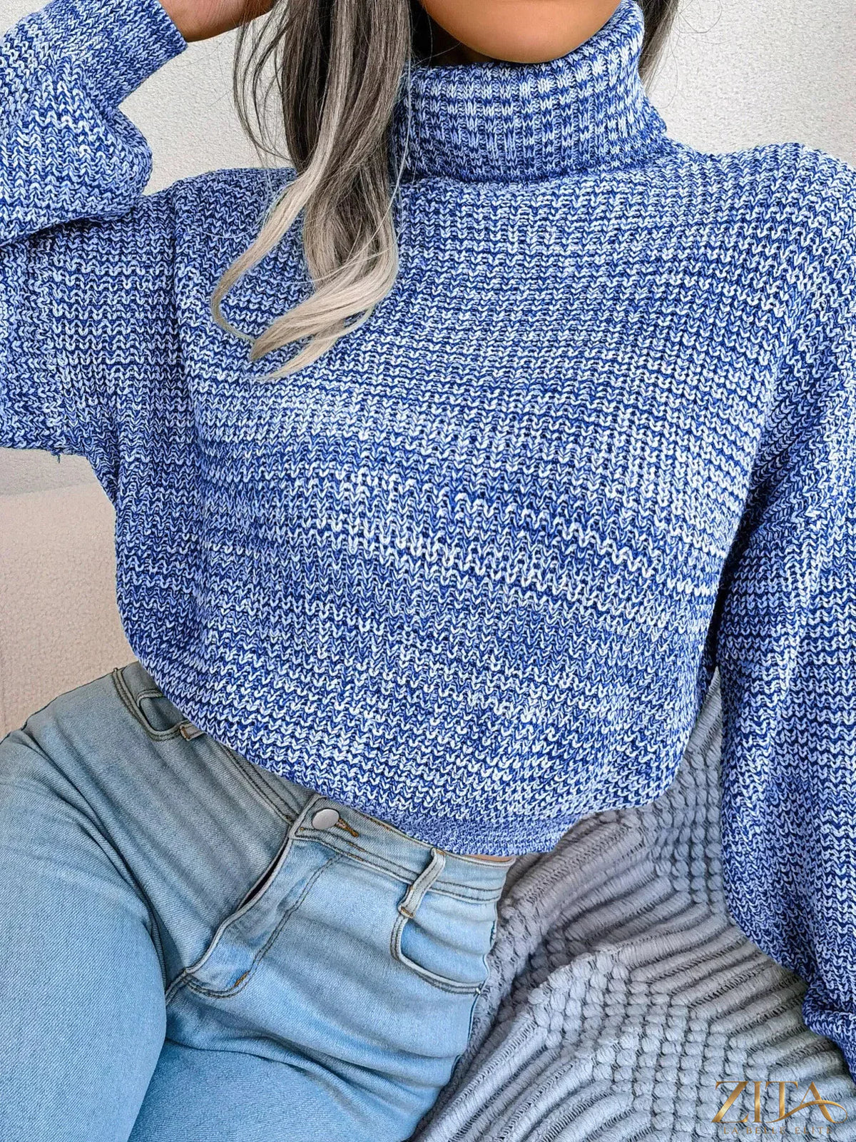 Cream-colored turtleneck dropped shoulder sweater by Trendsi, featuring soft knit fabric and relaxed fit.
