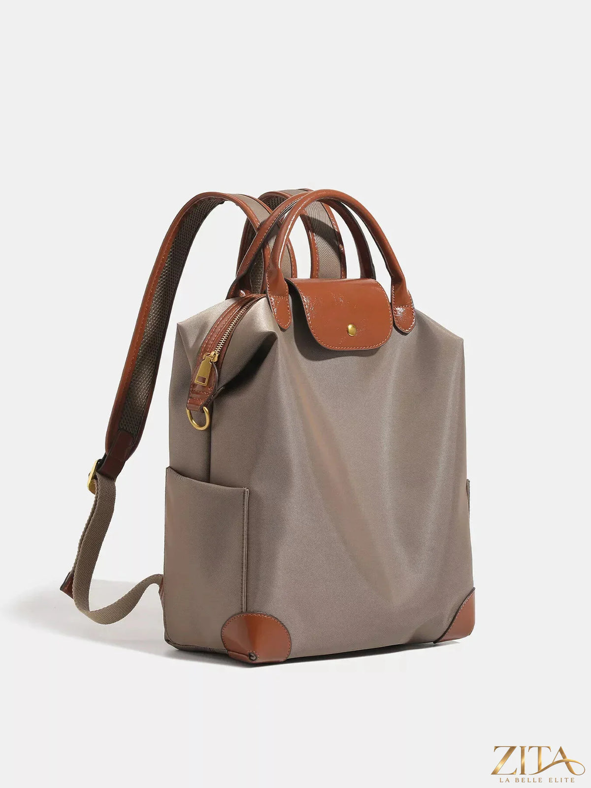 Leather trim backpack bag by Trendsi featuring a sleek design, adjustable straps, and spacious interior for everyday use.