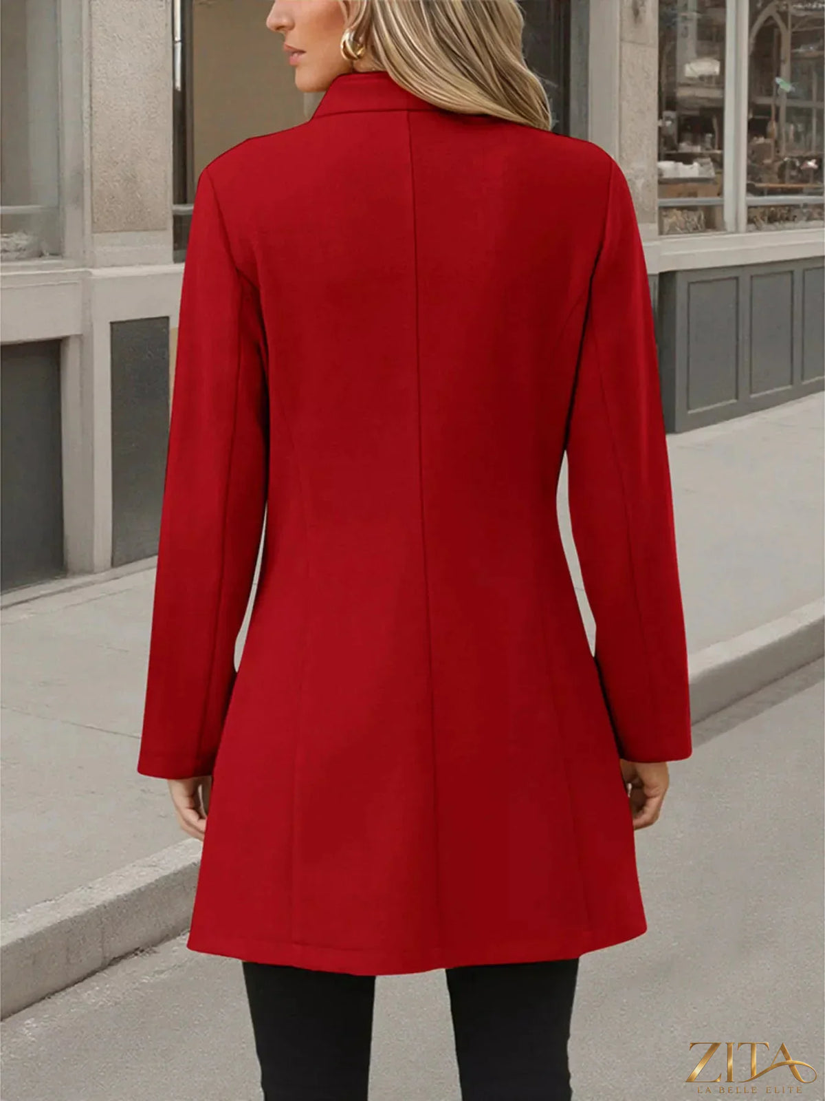 Zita La Belle Elite button-up long sleeve coat in neutral fabric, shown hanging on a wooden hanger against a white background.
