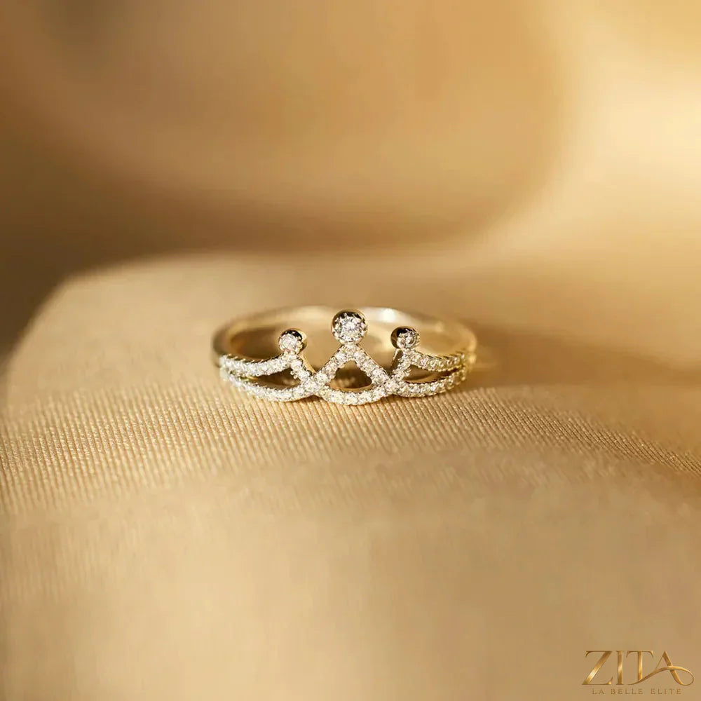 Sterling silver crown-shaped ring with inlaid zircon stones, crafted by Zita La Belle Elite.