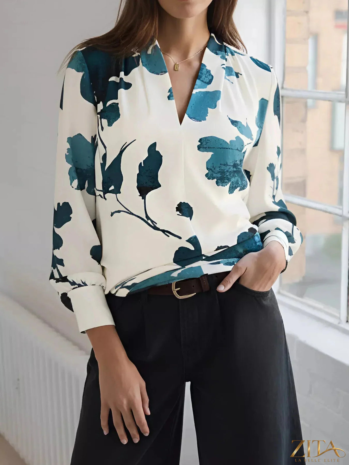 Printed V-neck long sleeve blouse from Zita La Belle Elite, featuring a stylish pattern and comfortable fit.