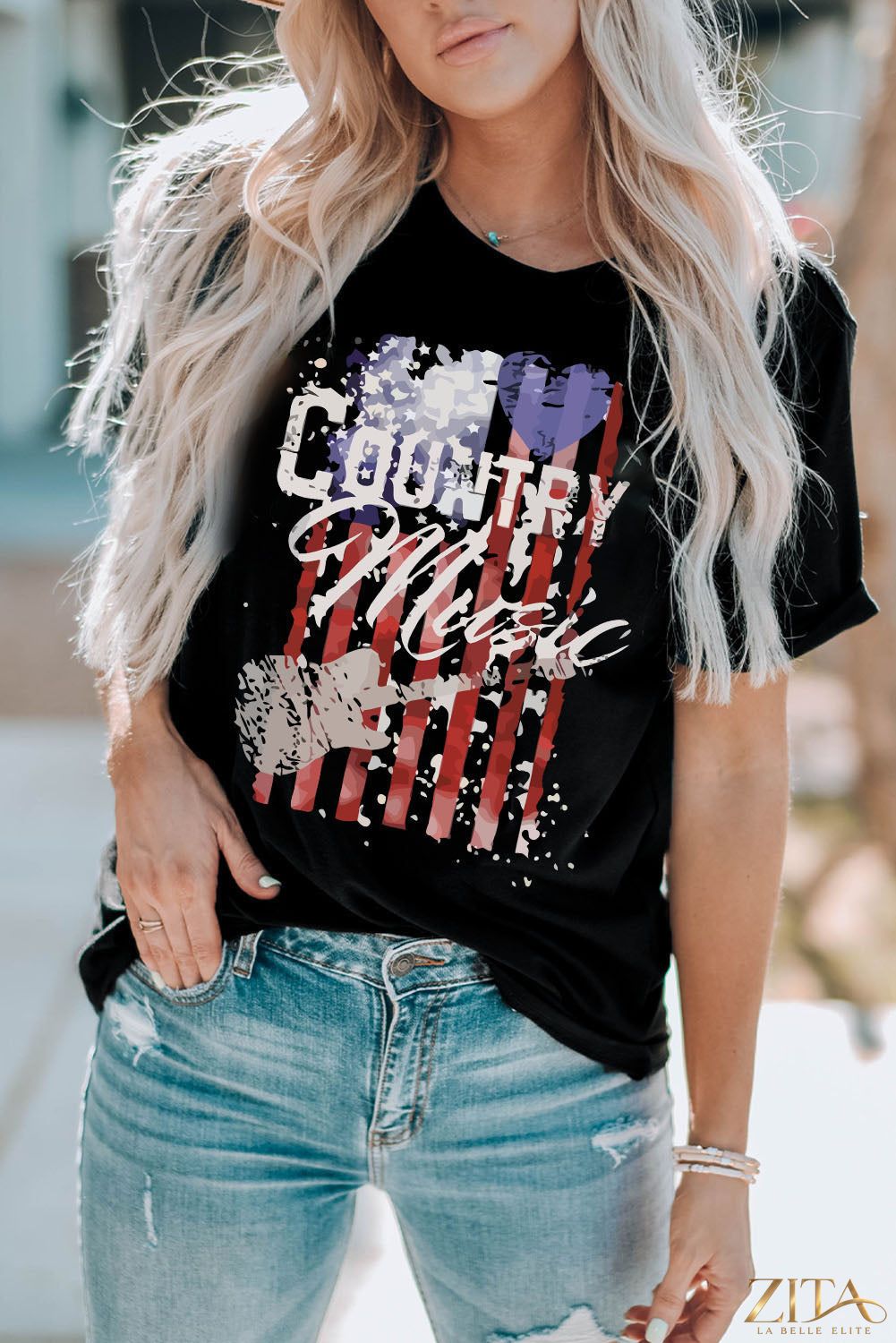 Country music graphic T-shirt by Trendsi featuring a bold country music design on a casual tee shirt.