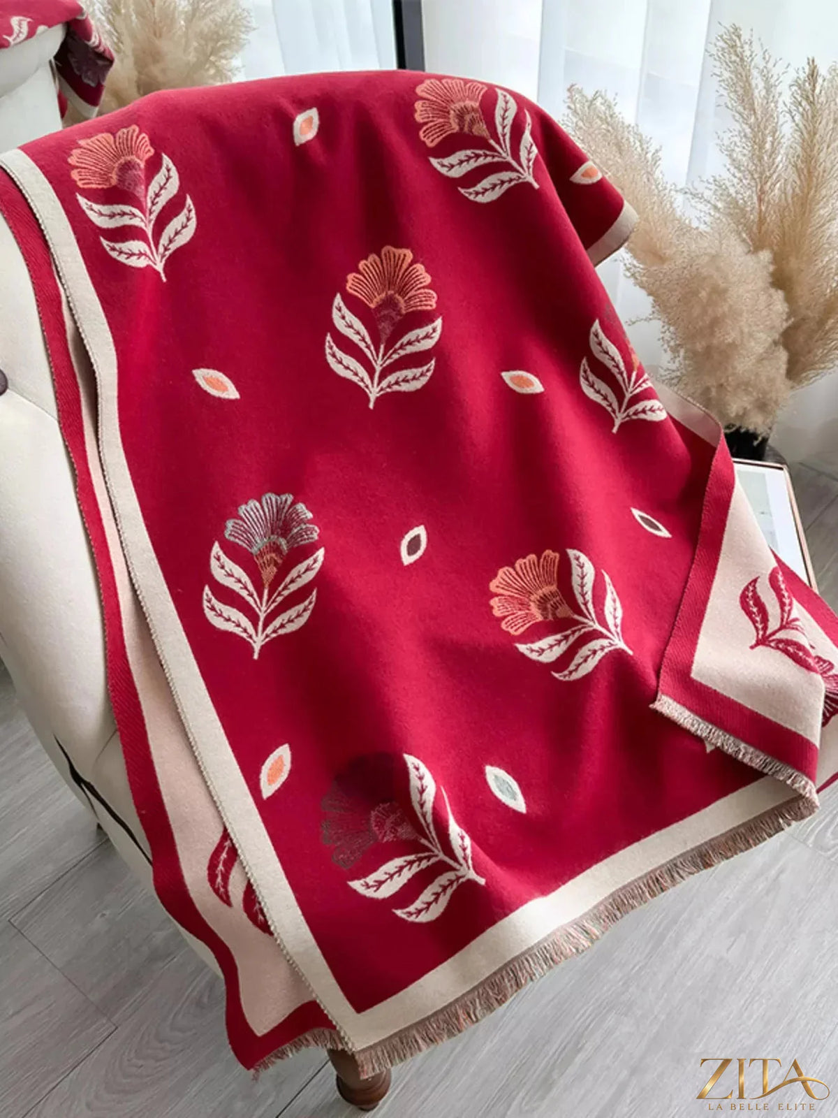 Printed raw hem shawl by Zita La Belle Elite featuring a stylish design and fringed edges, perfect for adding elegance to any outfit.