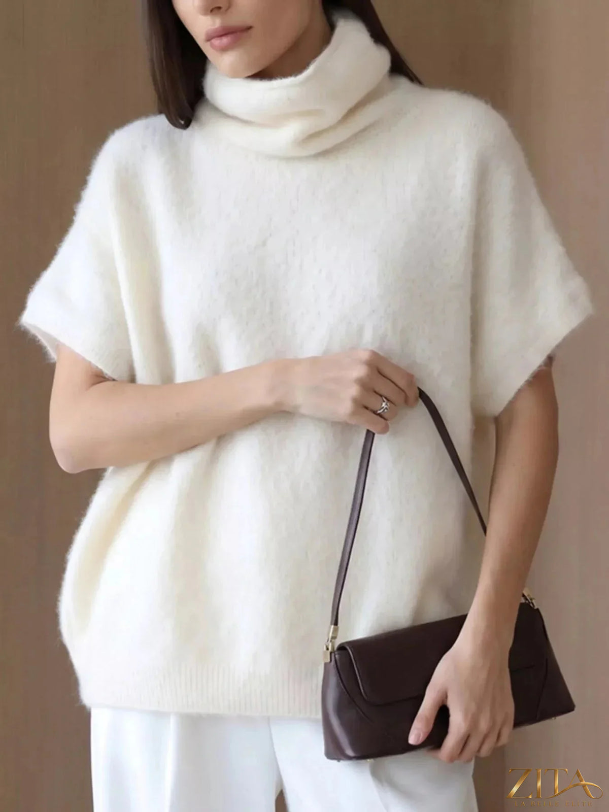 Zita La Belle Elite fuzzy short sleeve turtleneck sweater in soft, cozy fabric with a fitted silhouette.