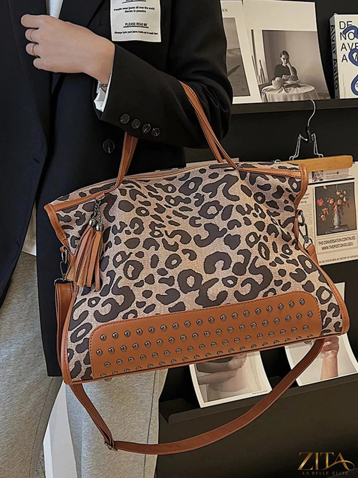 Leopard print tote bag with studded accents from Zita La Belle Elite, featuring sturdy handles and spacious interior.