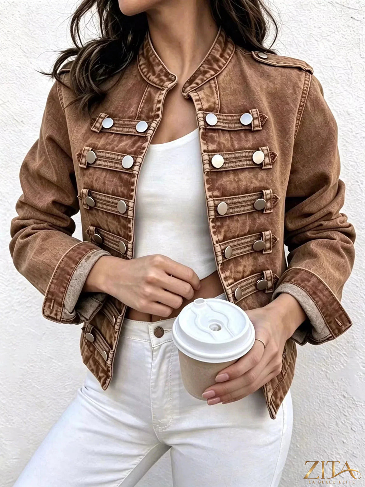 Vintage open front denim jacket with decorative buttons by Zita La Belle Elite, featuring distressed and classic denim styling.