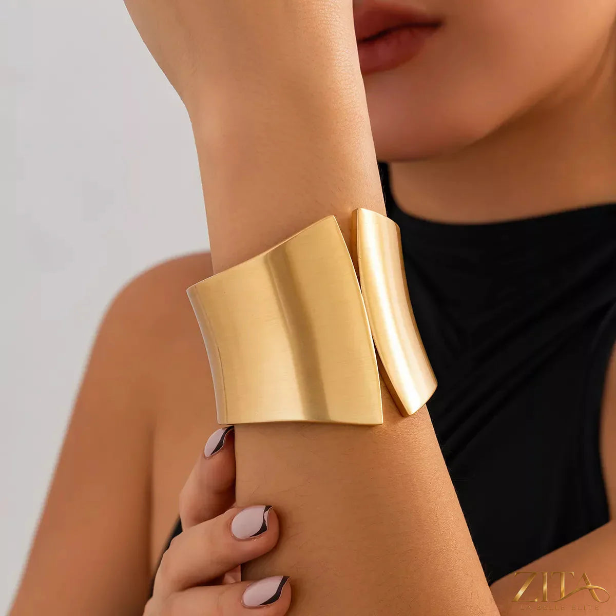 Zita La Belle Elite wide cuff bracelet with sleek metallic design and smooth finish, stylish jewelry accessory for wrists.