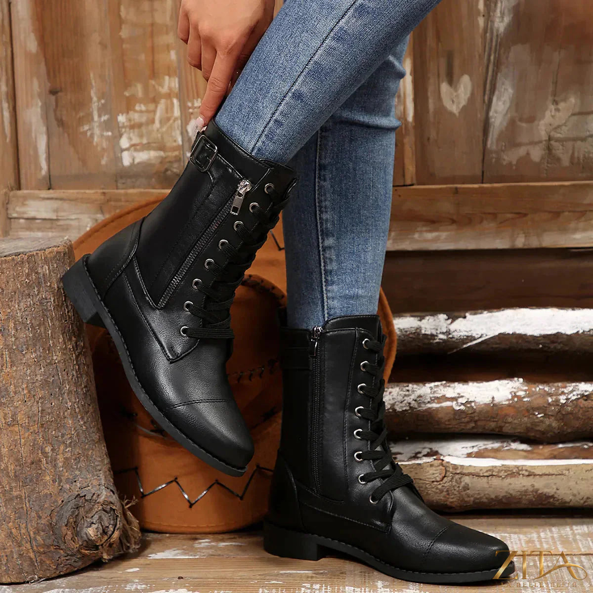 Zita La Belle Elite round toe lace-up block heel boots showing black leather exterior and chunky heel design.