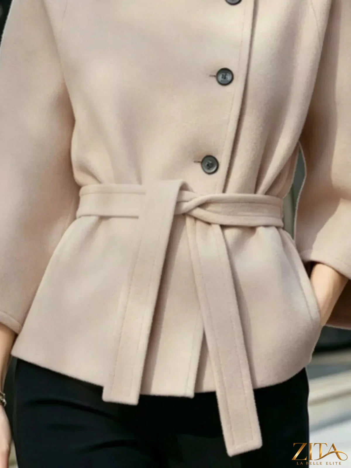 Zita La Belle Elite button-down cape coat with belted waist, shown on a model, featuring a stylish and elegant outerwear design.