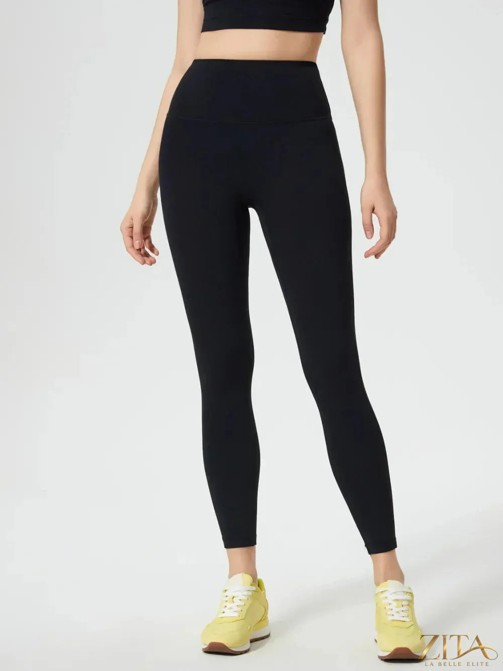 Trendsi Millennia wide waistband active leggings in black, featuring a stretchy fit and comfortable design for workouts.