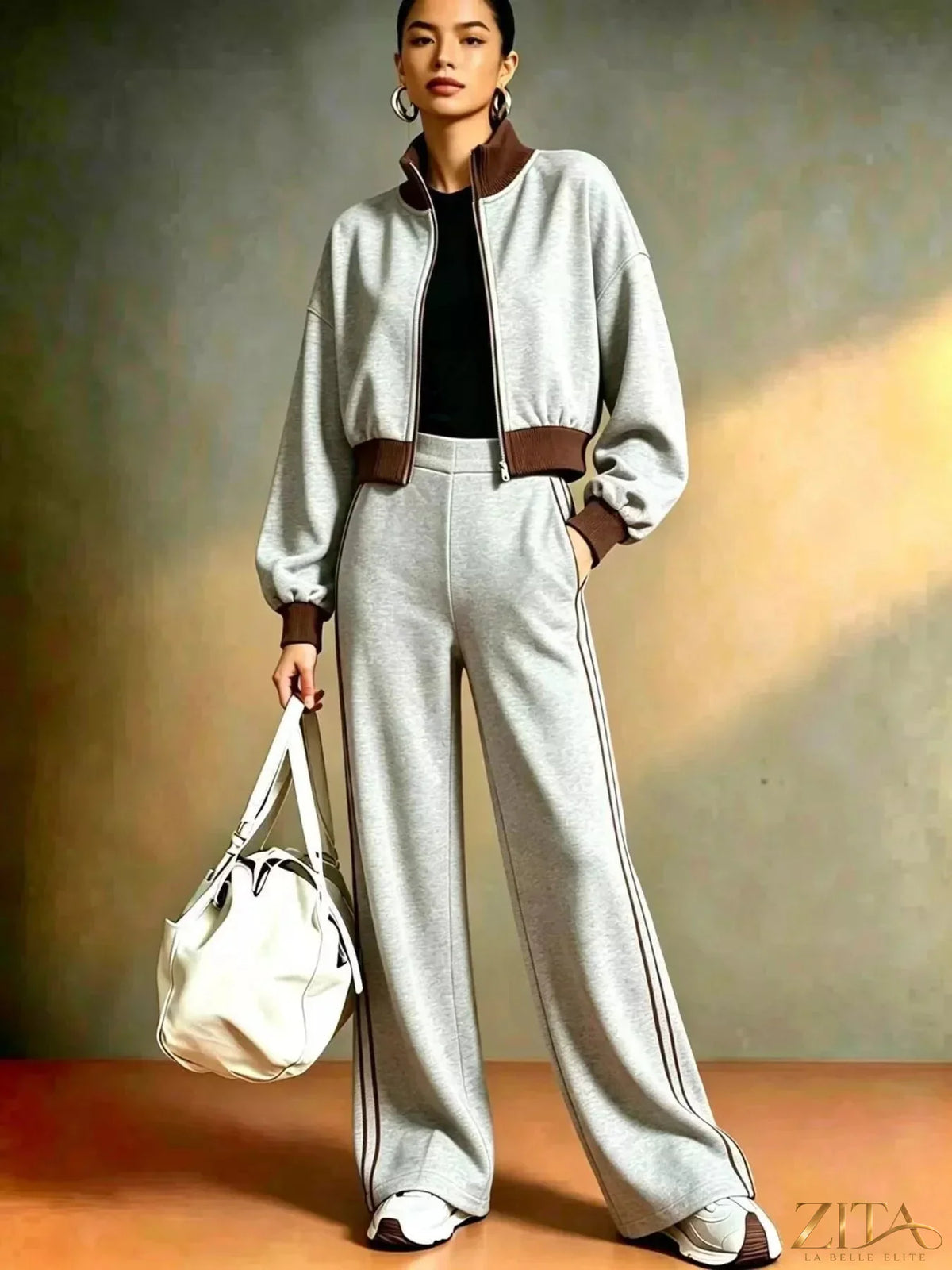 Contrast ribbed jacket and wide-leg pants tracksuit set by Zita La Belle Elite, featuring stylish ribbed fabric and relaxed fit.