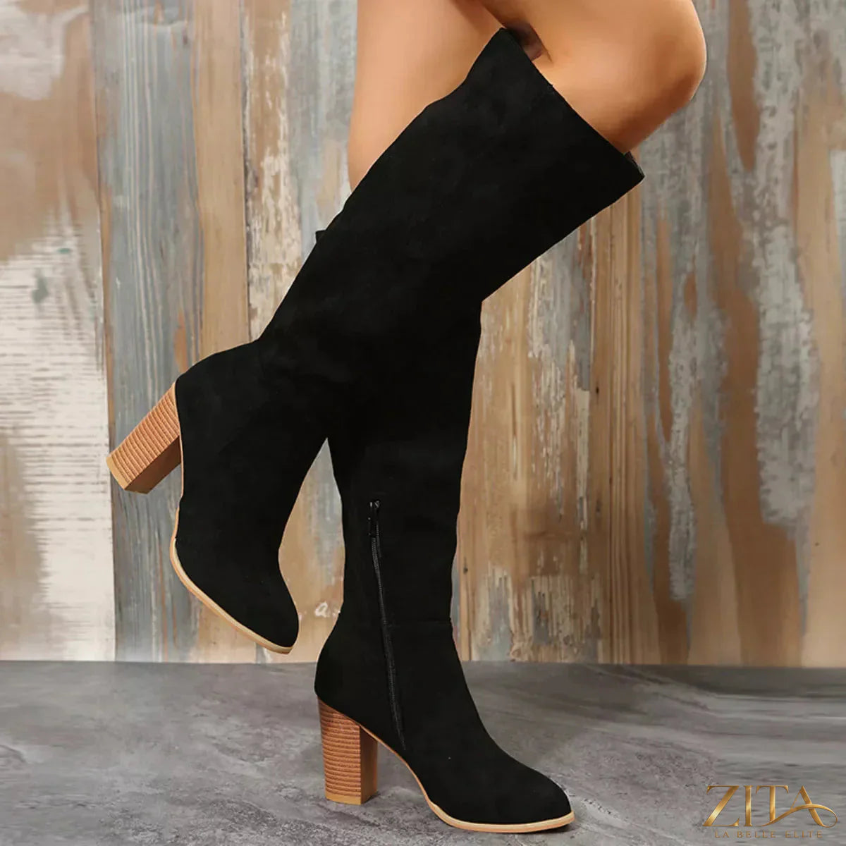 Zita La Belle Elite point toe block heel boots featuring sleek design and sturdy heels in black leather finish.