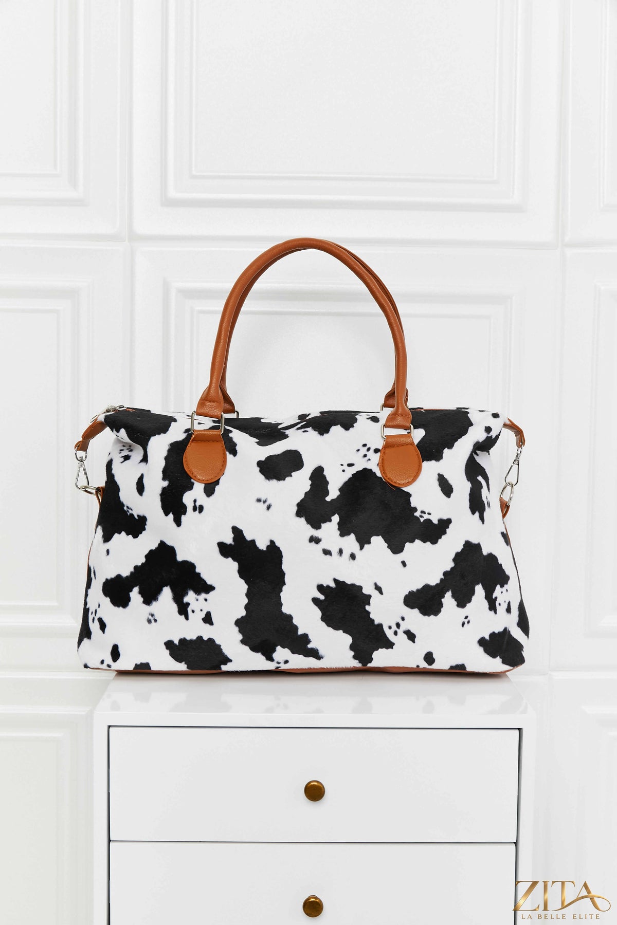 Animal print brushed weekender bag by Zita La Belle Elite, featuring a spacious design and stylish animal pattern.