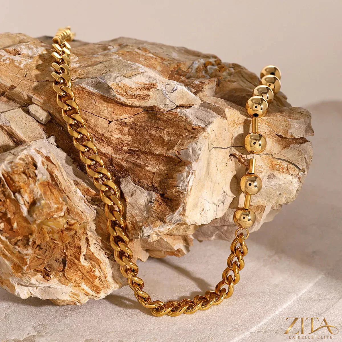 18K gold-plated toggle clasp necklace by Zita La Belle Elite, showing the shiny metal clasp and elegant chain detail