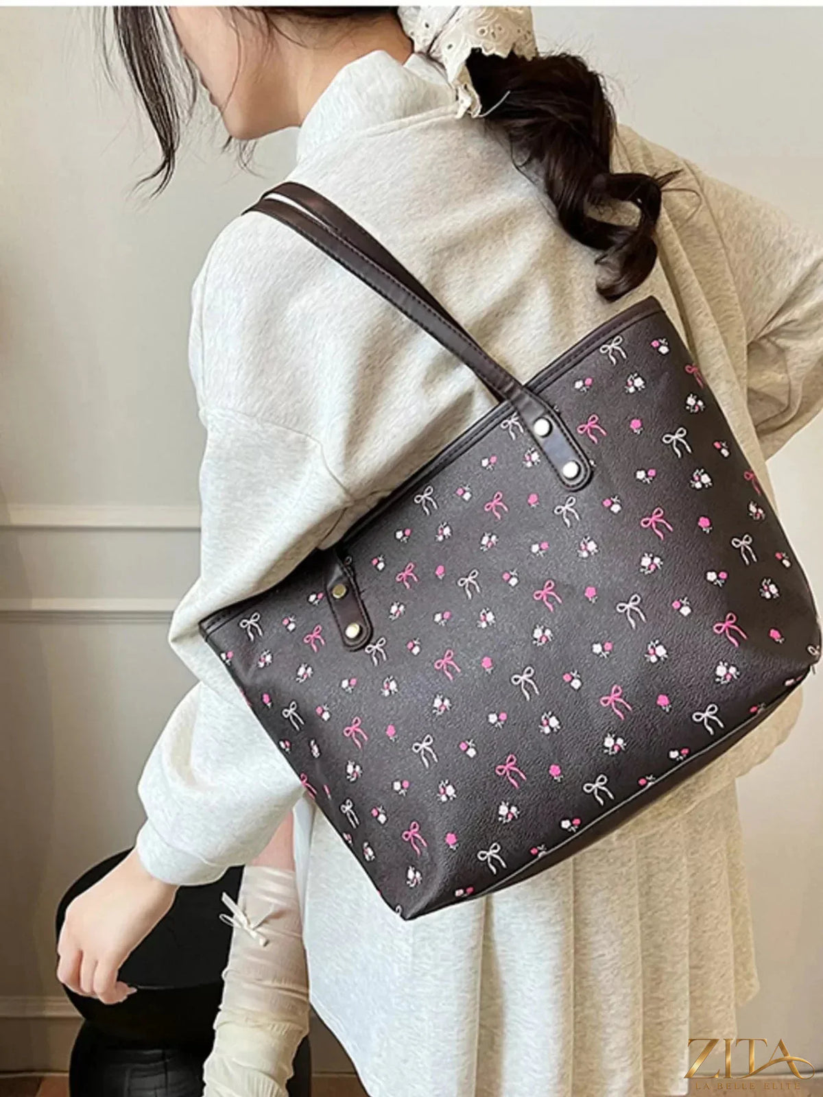 Printed tote shoulder bag with pouch from Zita La Belle Elite, featuring a colorful design and sturdy handles.