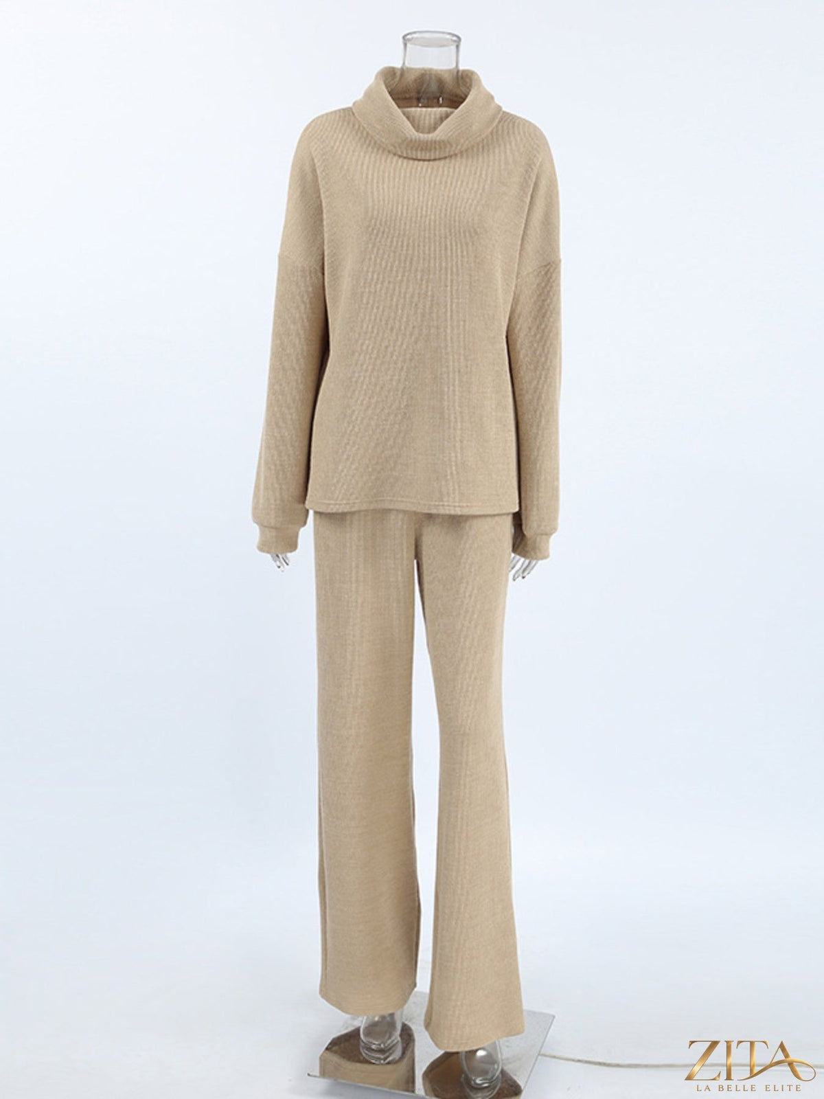 Trendsi turtleneck long sleeve top and matching pants set in soft fabric, shown on a model in a casual indoor setting.