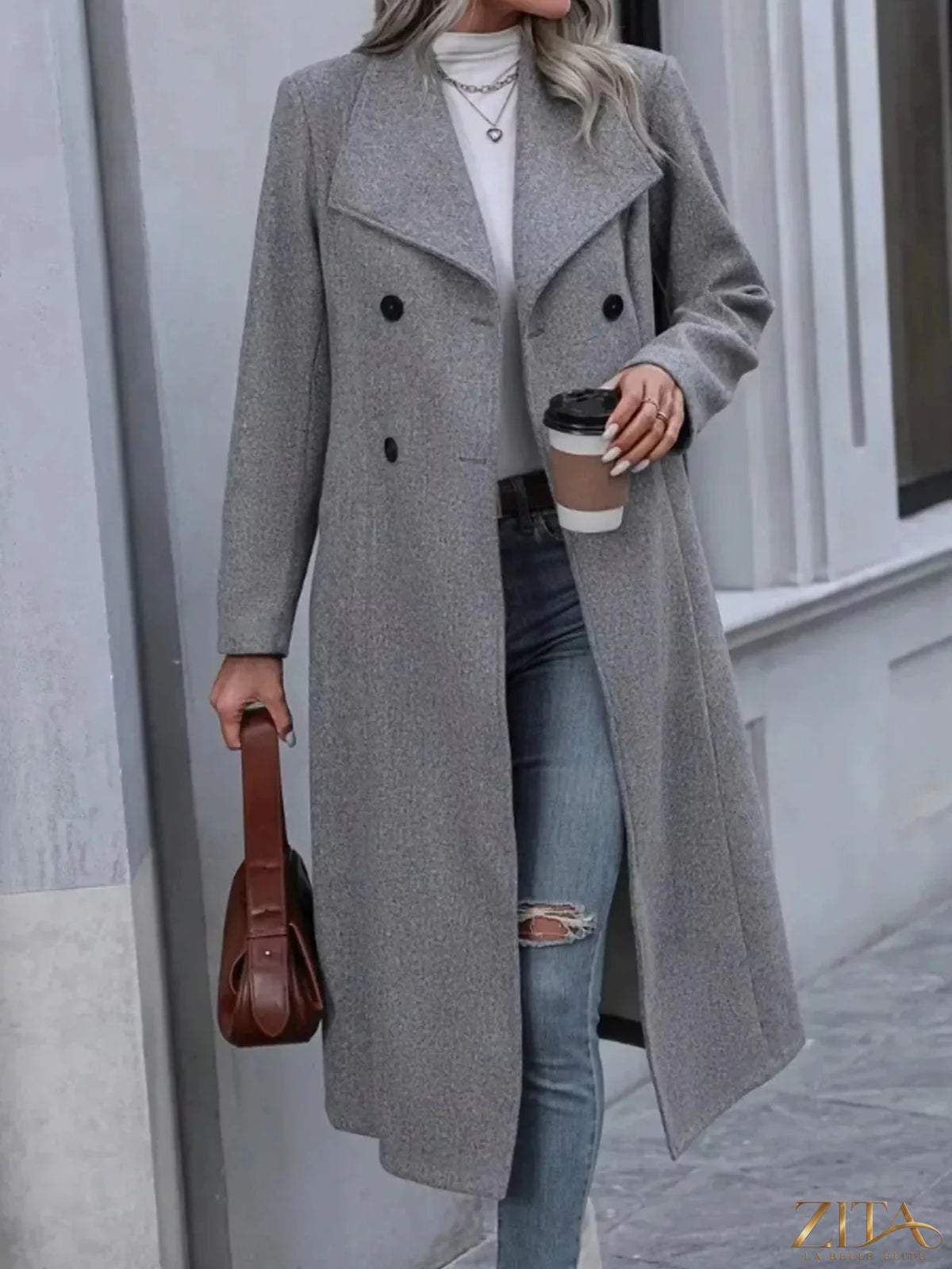 Zita La Belle Elite double-breasted longline overcoat in classic wool fabric, displayed on a hanger.