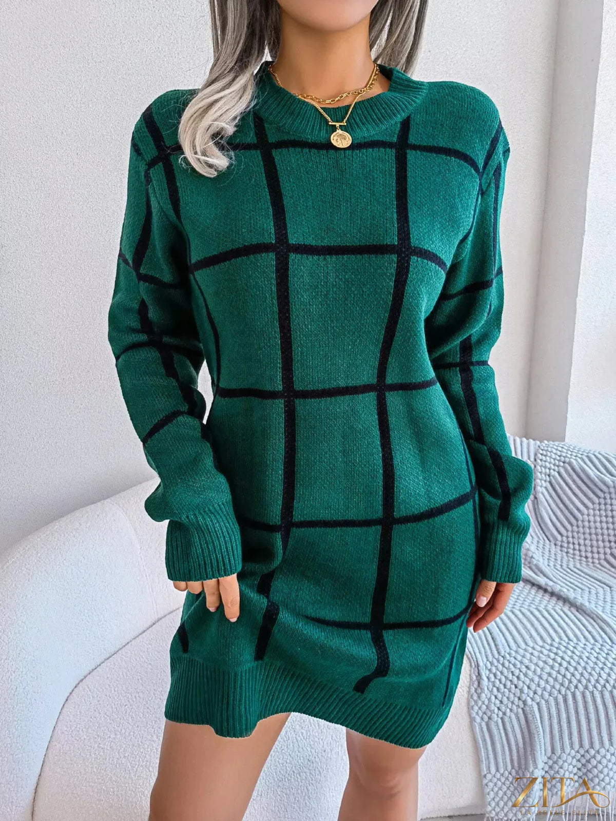 Zita La Belle Elite plaid pattern long sleeve sweater dress displayed on a hanger with a cozy, casual style.