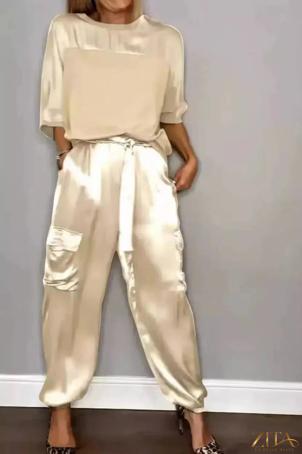 Satin round neck top and matching pants set in a stylish, smooth fabric, designed for a chic and comfortable look.