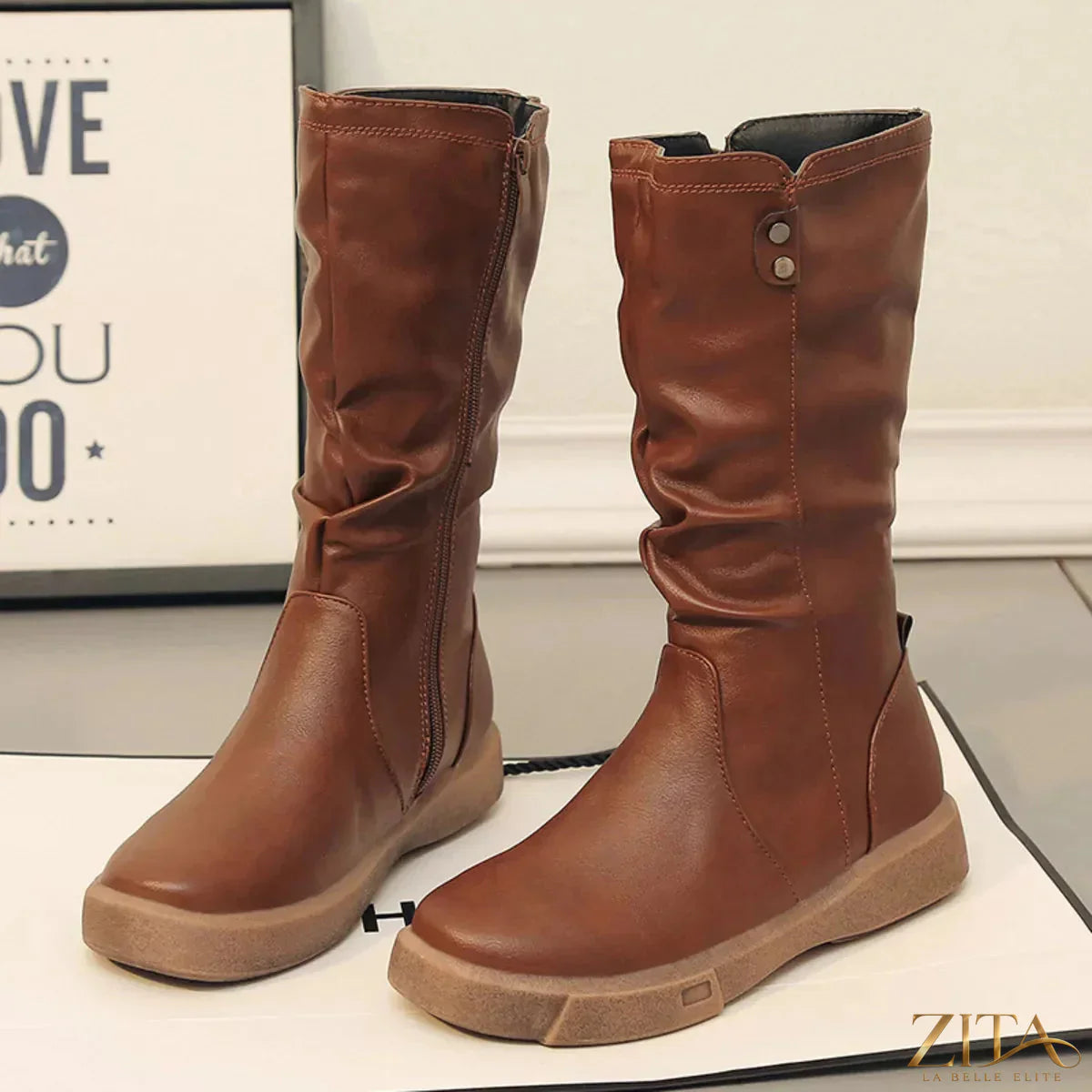 Zita La Belle Elite round toe platform boots with chunky heels and sleek black leather finish.
