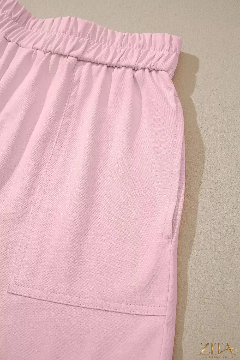 Trendsi round neck tee and matching shorts set in soft fabric, featuring a casual, comfortable fit for everyday wear.