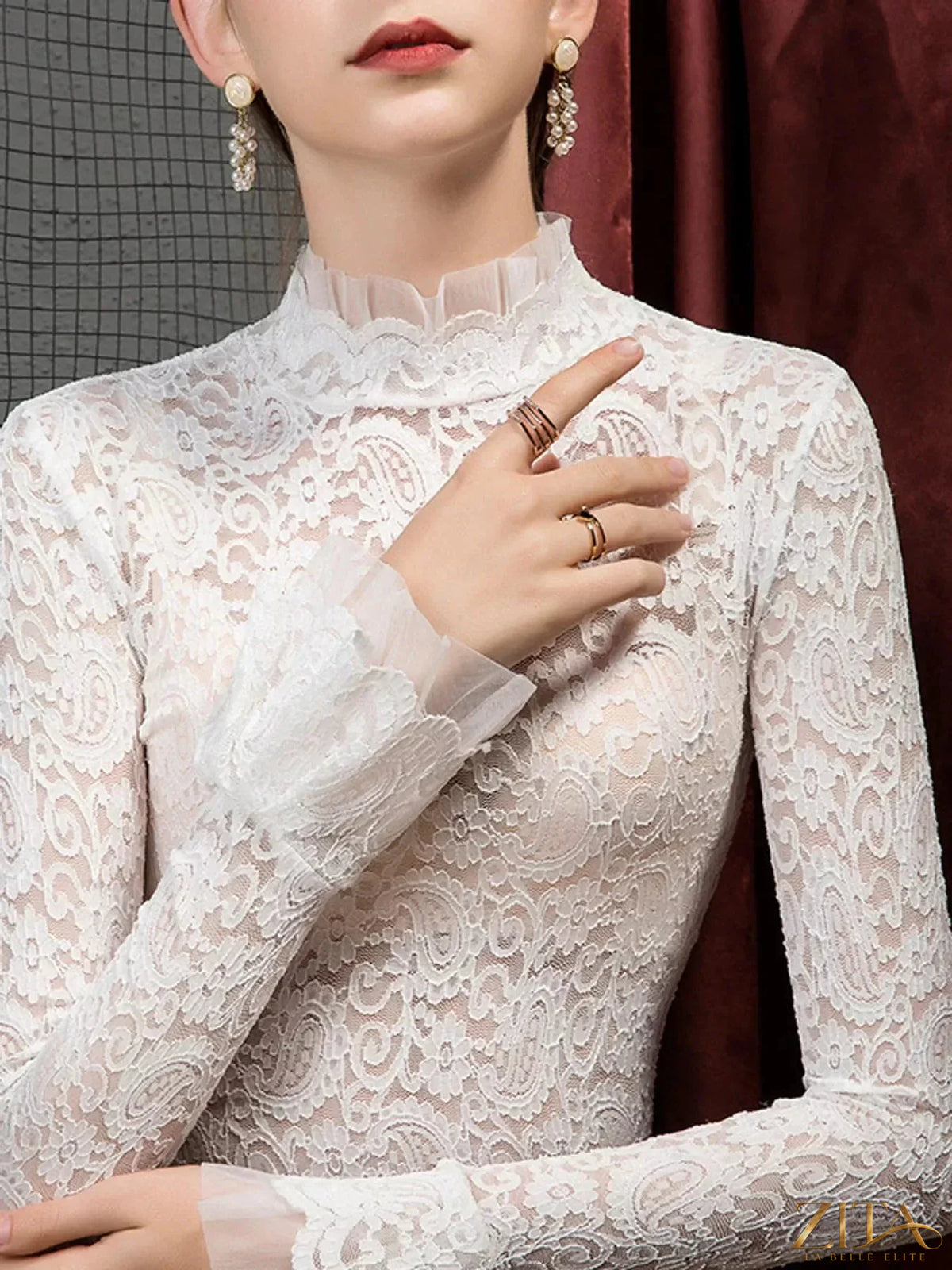 Plus size lace mock neck long sleeve blouse by Zita La Belle Elite, featuring intricate lace details and a classic silhouette.