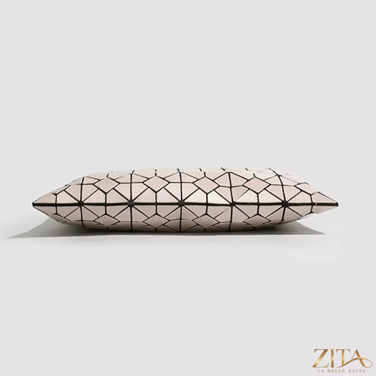 Zita La Belle Elite geometric lattice pattern handbag with structured design and top handles, featuring intricate cut-out details.