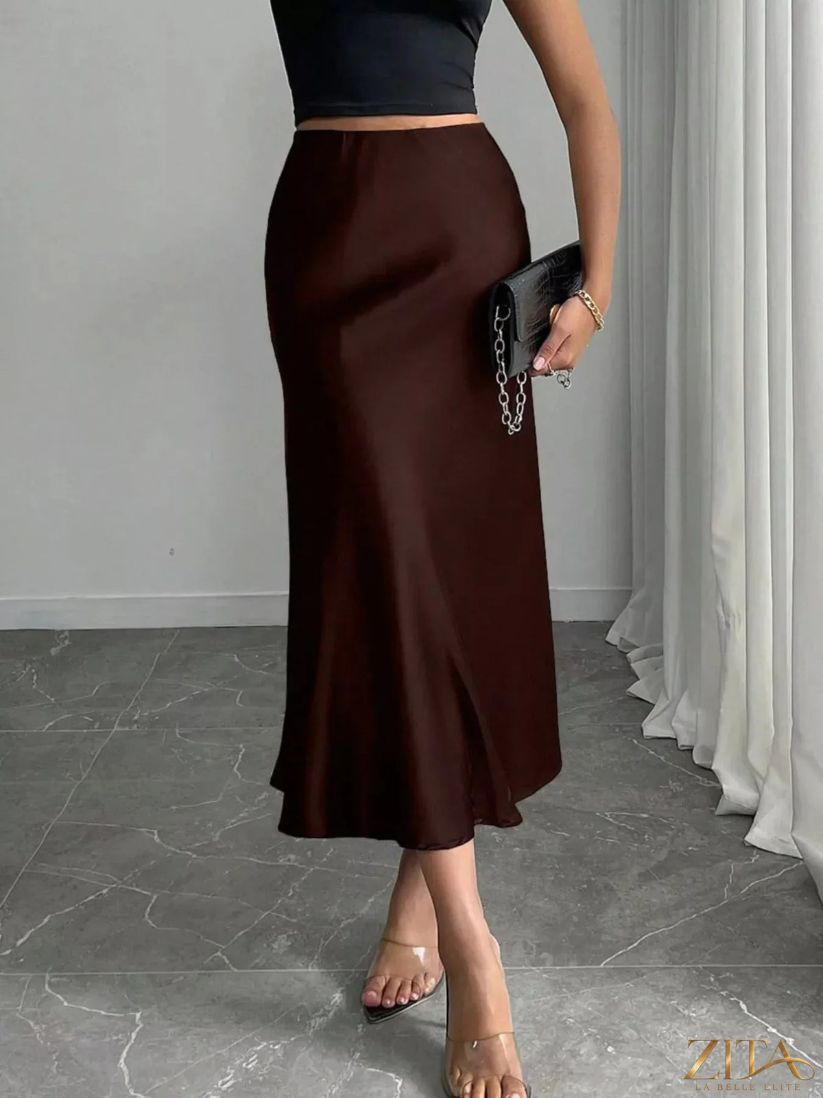 Satin midi skirt from Trendsi with a smooth, shiny fabric and a sleek, flowing silhouette, shown in a stylish, fitted design.