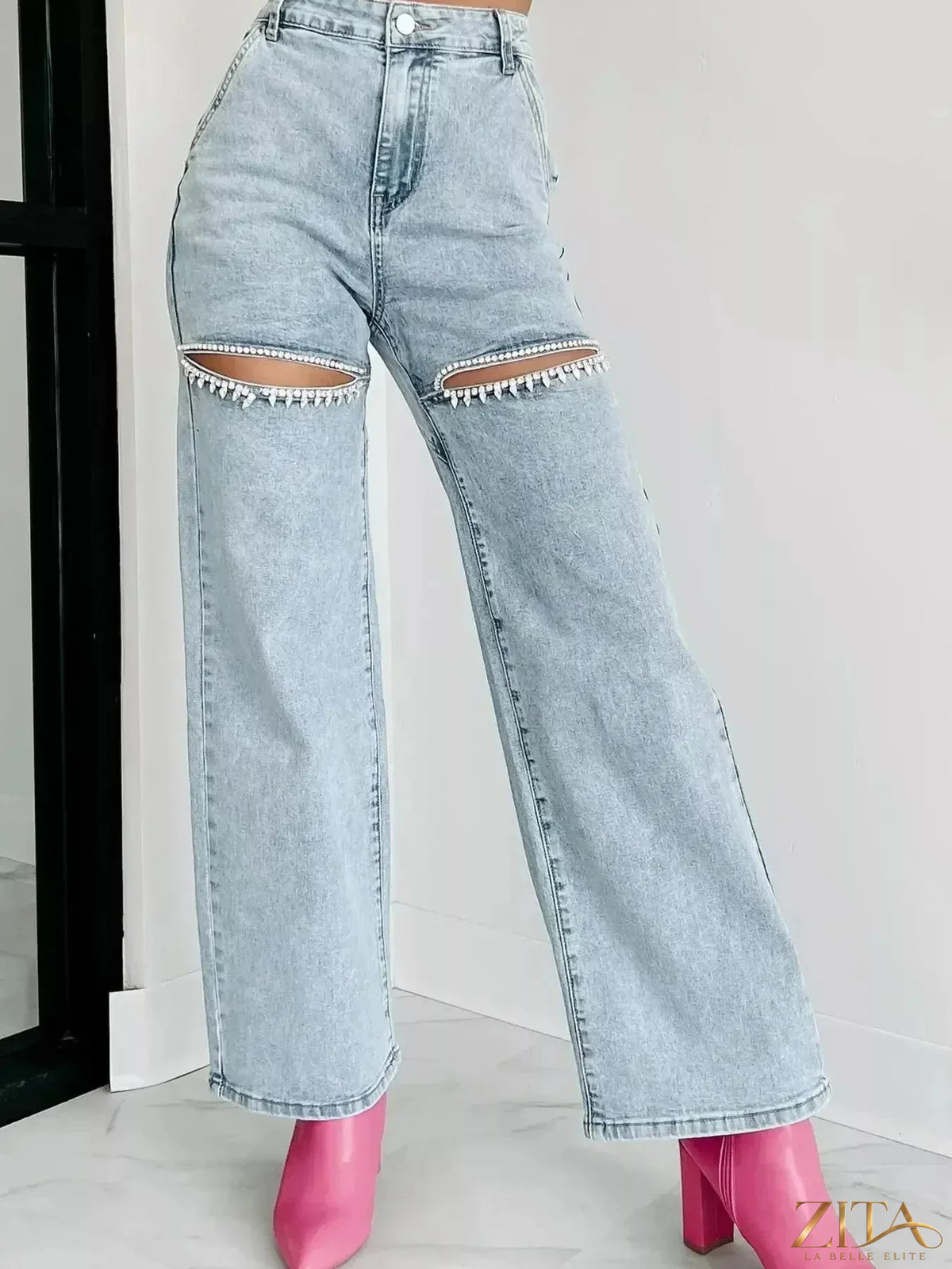 Zita La Belle Elite high waist cut-out wide-leg jeans showing distressed details and fashionable fit in a light denim fabric.