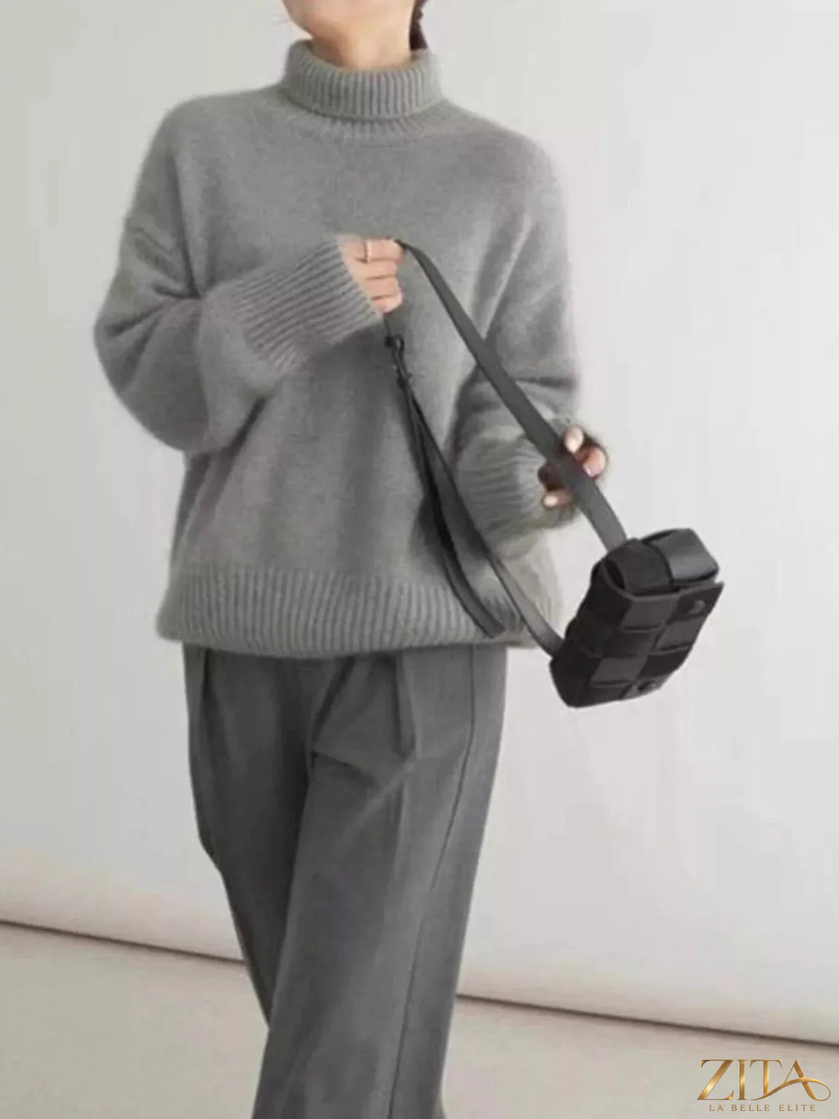 Zita La Belle Elite turtleneck dropped shoulder sweater in cozy knit fabric, featuring a relaxed fit and ribbed cuffs.