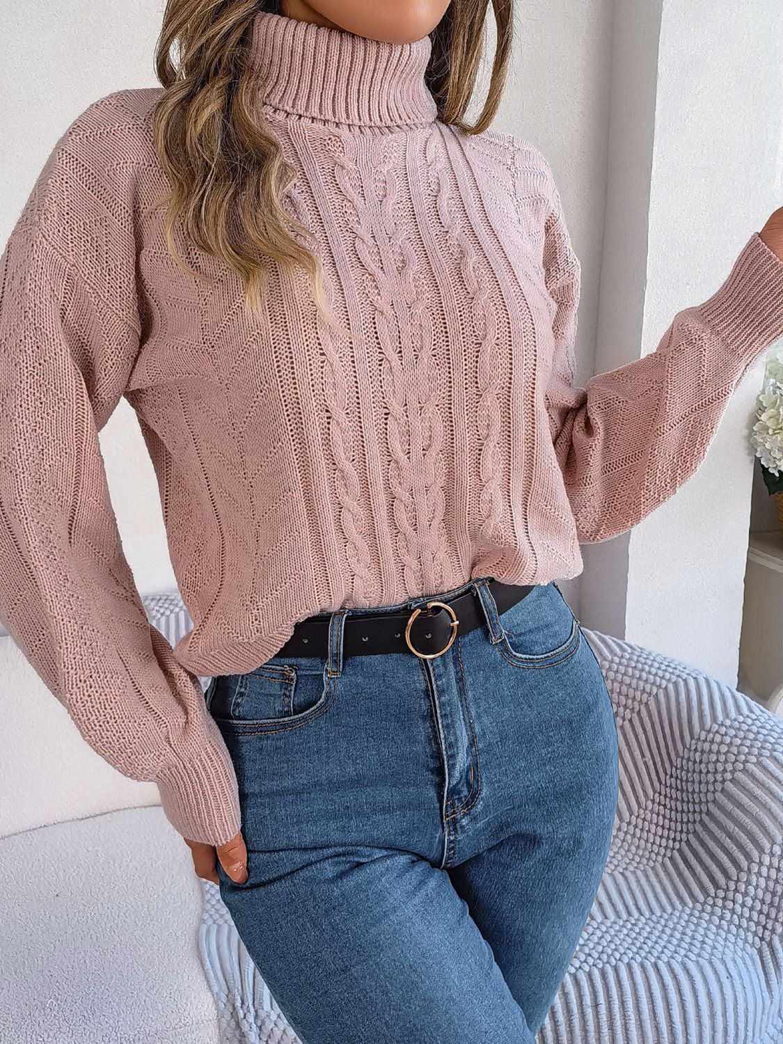 Zita La Belle Elite cable-knit turtleneck sweater in soft fabric, featuring a classic ribbed collar and textured knit pattern.