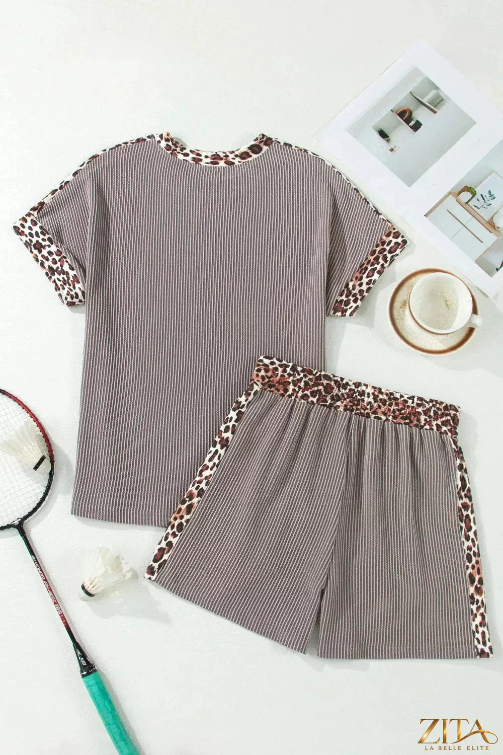 Leopard trim ribbed knit tee and shorts set by Trendsi, featuring a matching two-piece outfit with leopard accents.