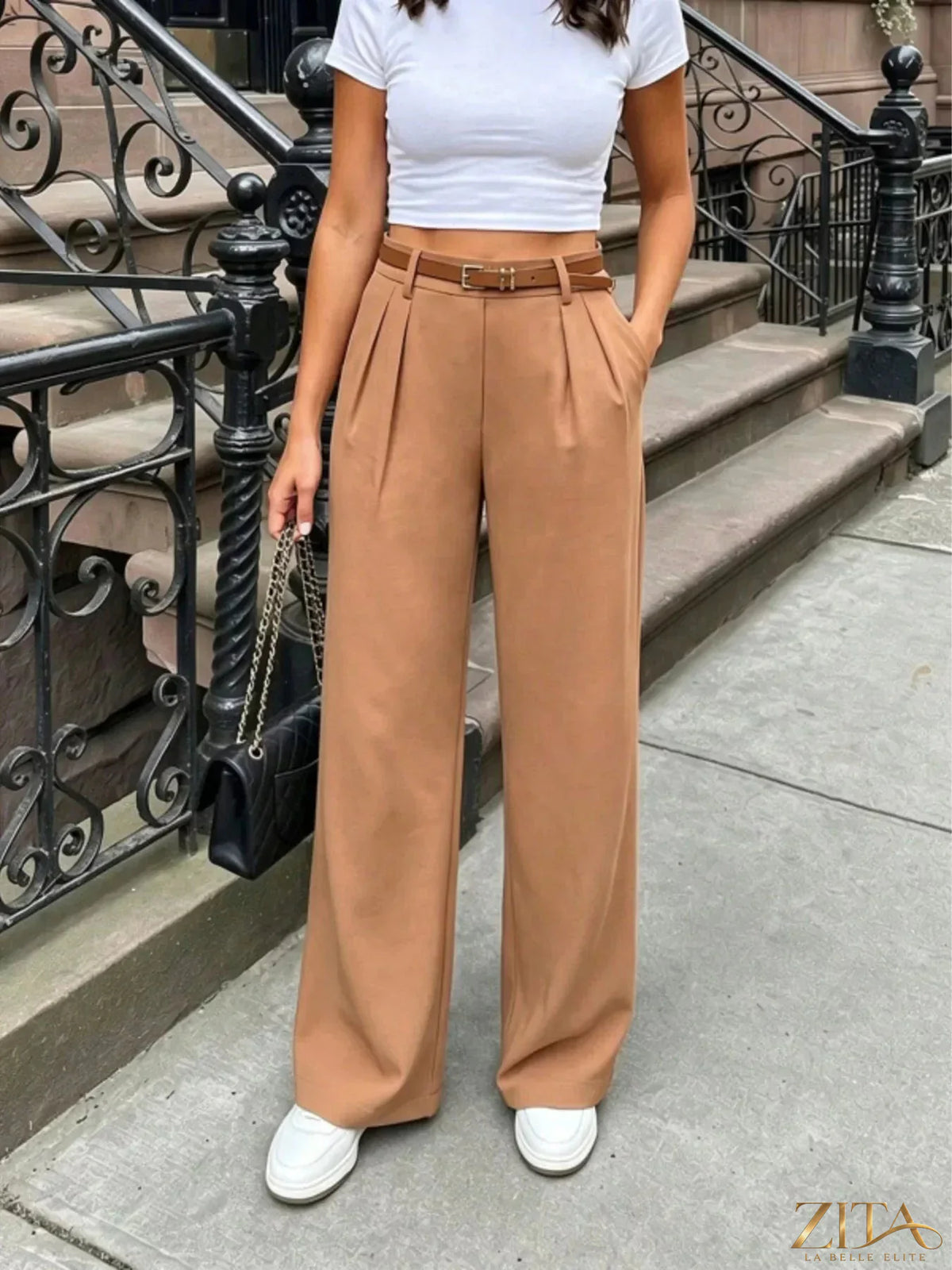 Zita La Belle Elite pleated wide-leg pants in a flowing fabric, showcasing their relaxed fit and stylish design.