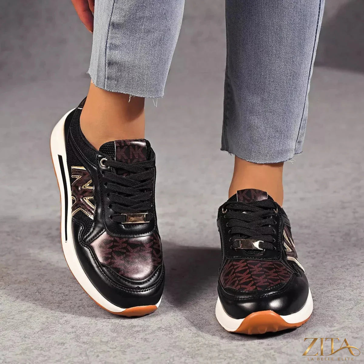 Zita La Belle Elite lace-up round toe sneakers with white and black design, featuring comfortable casual shoe style.